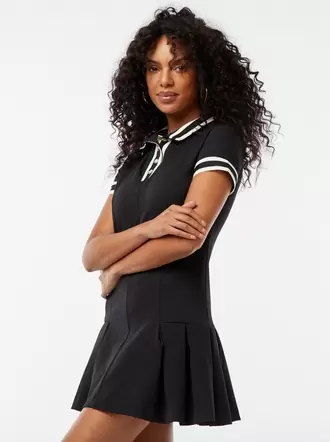 Oferta de Vestido tipo polo con volante en el bajo por 25€ en Kiabi