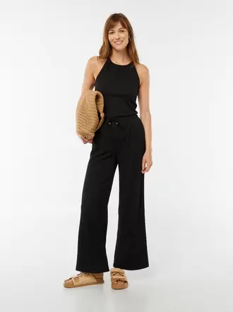 Oferta de Pantalón ancho de punto gofrado por 18€ en Kiabi