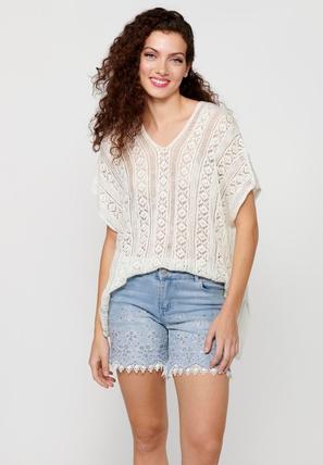 Oferta de Jersey tricot holgado de punto de mangas anchas de Color Crudo para Mujer por 29,99€ en Koröshi