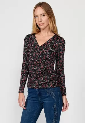 Oferta de Camiseta de manga larga y escote cruzado con pieza lateral, estampado flor pequeña color Negro para Mujer por 39,99€ en Koröshi