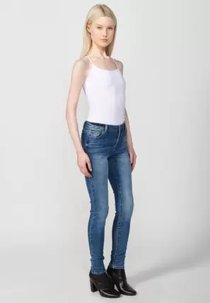 Oferta de Pantalón largo denim slim fit con cierre delantero con cremallera y botón para mujer de color azul oscuro por 49,99€ en Koröshi