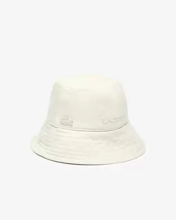 Oferta de Gorro de pescador de denim en tono natural por 65€ en Lacoste