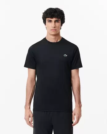 Oferta de Camiseta deportiva de corte ajustado de punto jersey elástico por 59€ en Lacoste