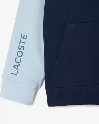 Oferta de Sudadera con capucha con bloques de color por 85€ en Lacoste