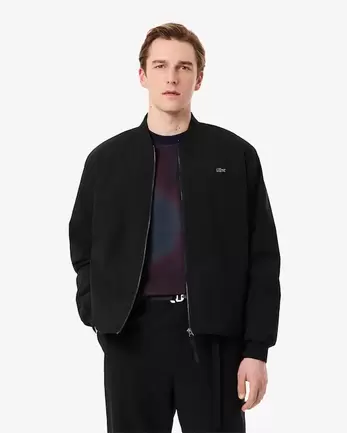 Oferta de Cazadora tipo bomber acolchada hidrófuga y elástica por 290€ en Lacoste