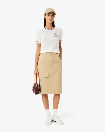 Oferta de Falda midi de sarga de corte recto por 155€ en Lacoste