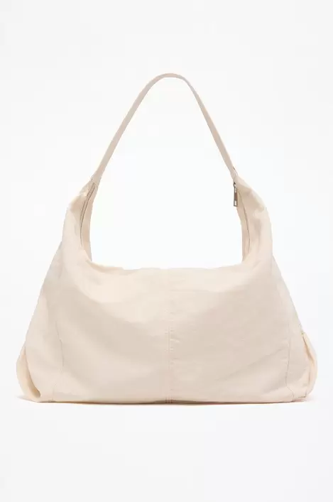 Oferta de Bolso saco parachute por 12,99€ en Lefties