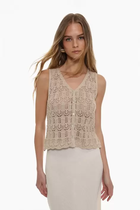 Oferta de Top punto calado por 12,99€ en Lefties