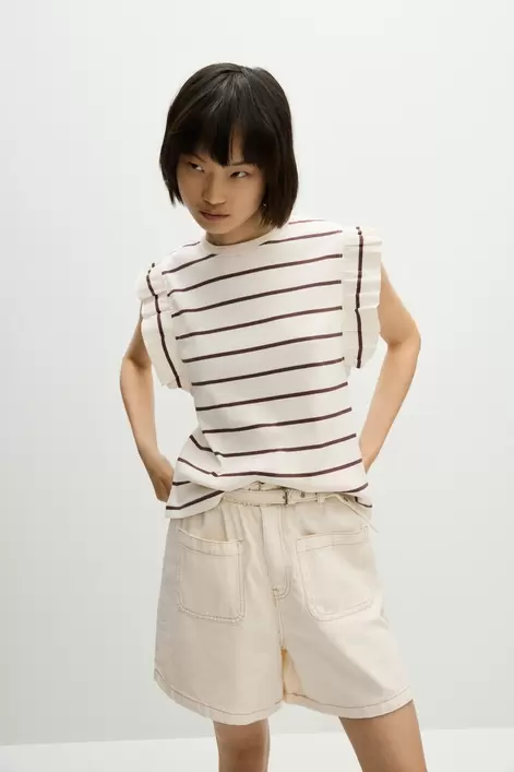Oferta de Camiseta volantes por 7,99€ en Lefties