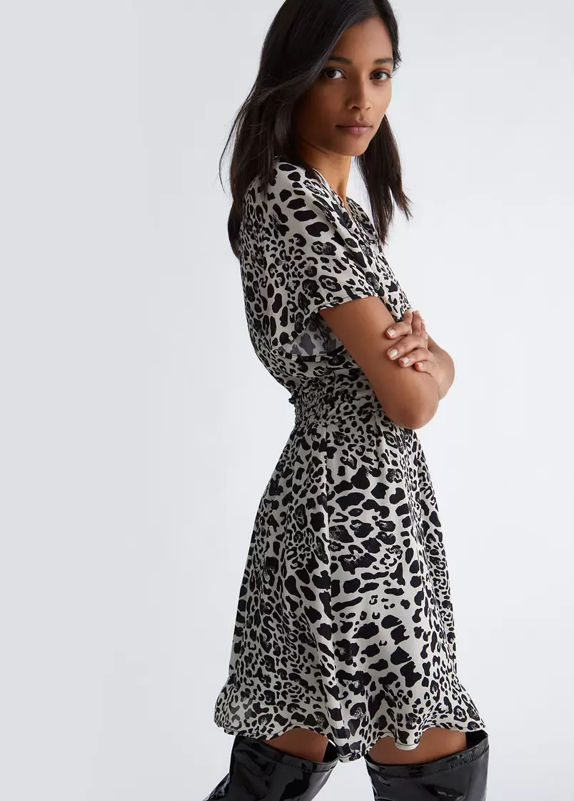 Oferta de Vestido corto con estampado animal por 121€ en Liu Jo