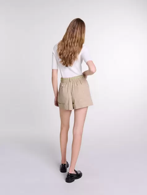 Oferta de Short de algodón con tachuelas por 107,5€ en Maje