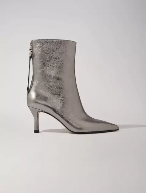 Oferta de Botines con puntera metalizada por 262,5€ en Maje