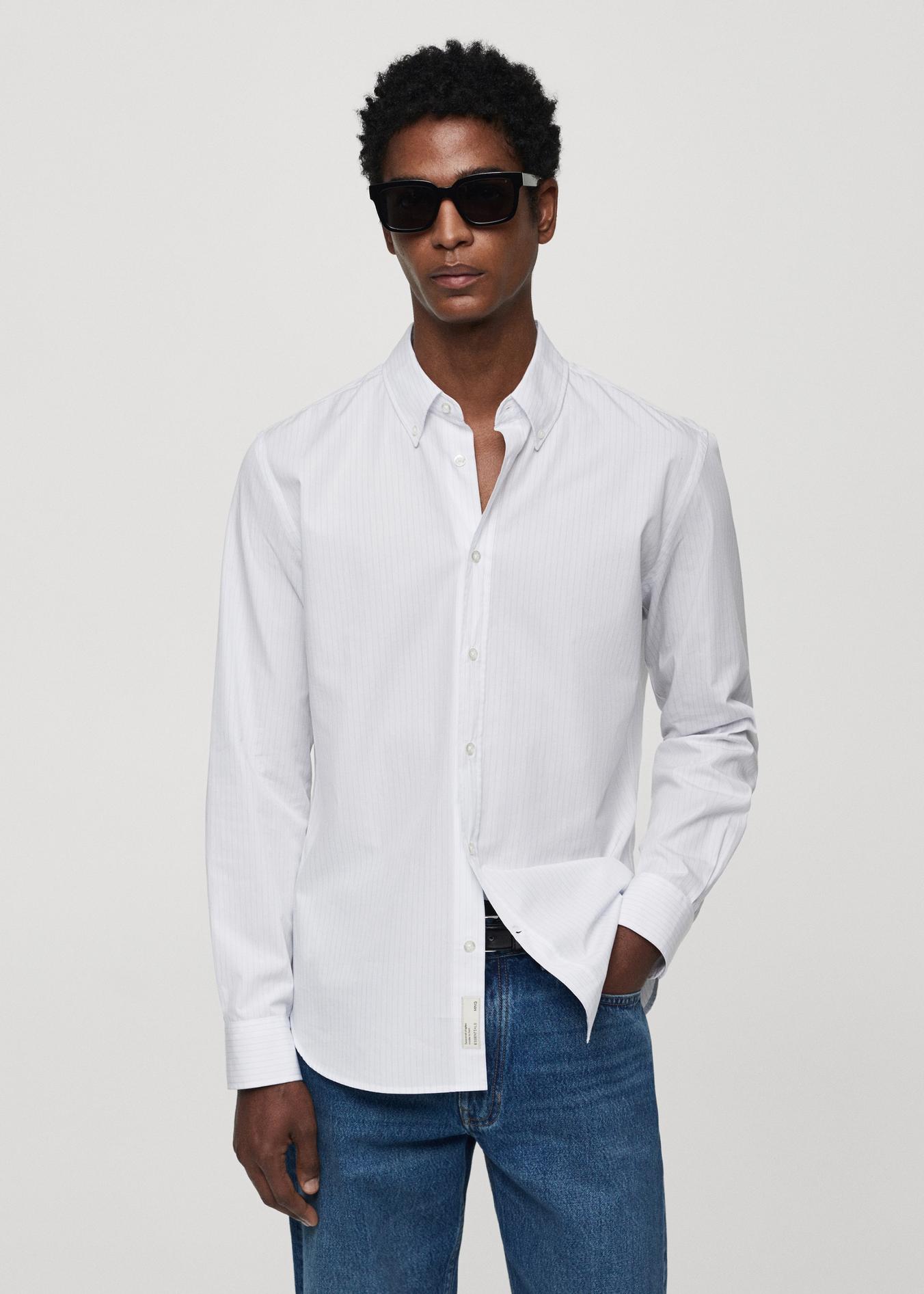 Oferta de Camisa regular fit algodón rayas por 19,99€ en MANGO