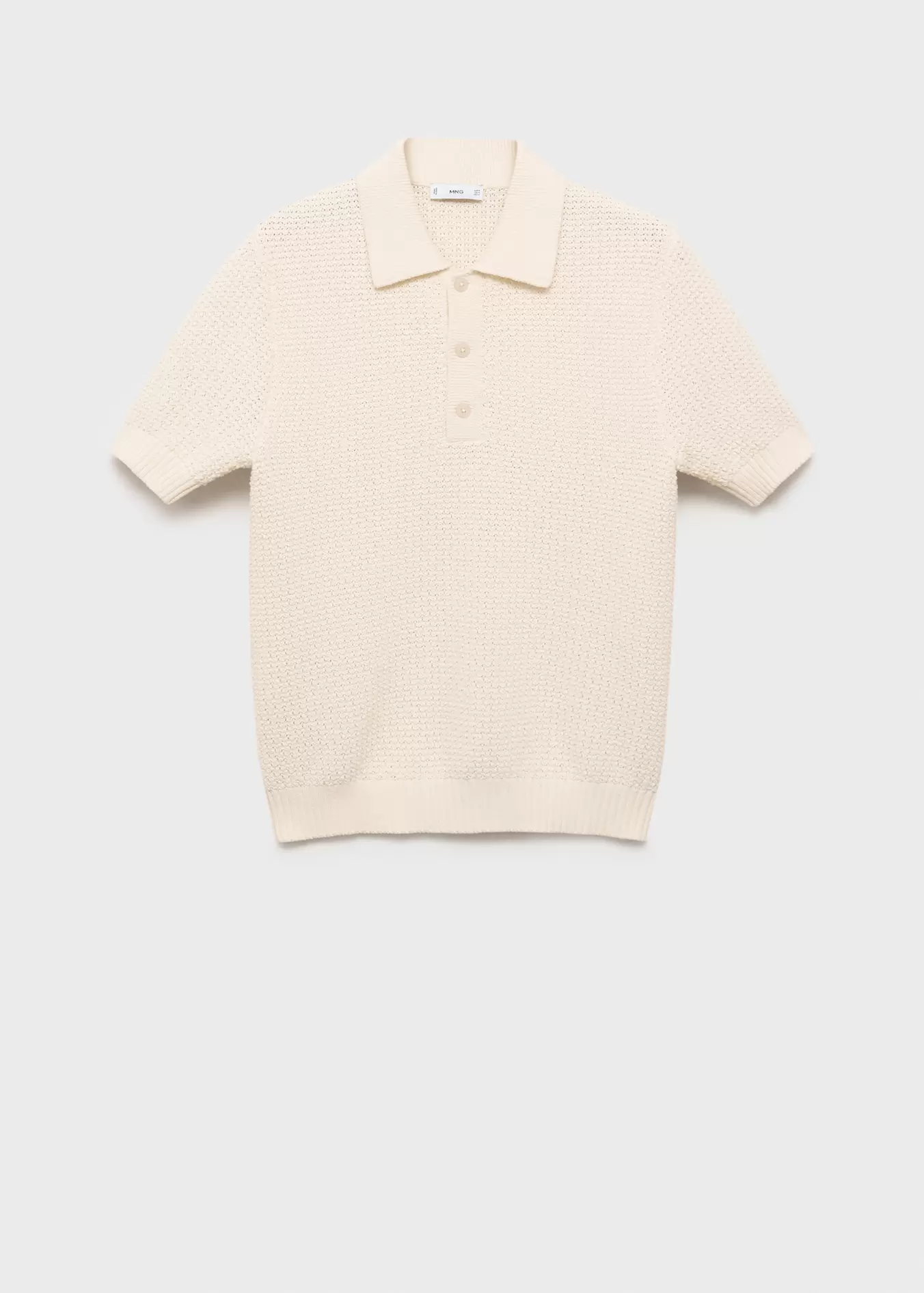 Oferta de Polo punto algodón calado por 35,99€ en MANGO