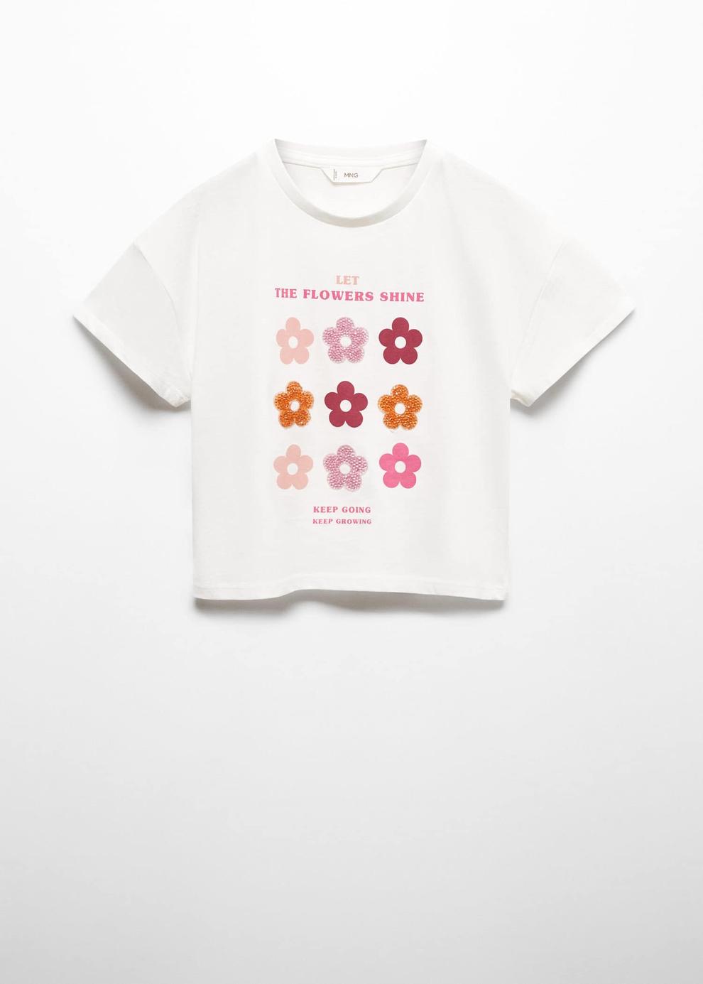 Oferta de Camiseta flores relieve por 12,99€ en MANGO Kids