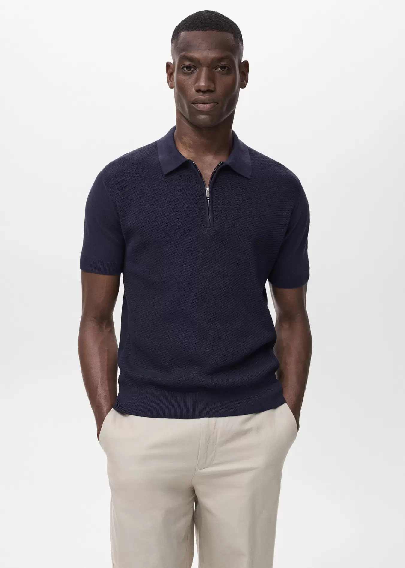 Oferta de Polo punto calado cremallera por 29,99€ en MANGO Man