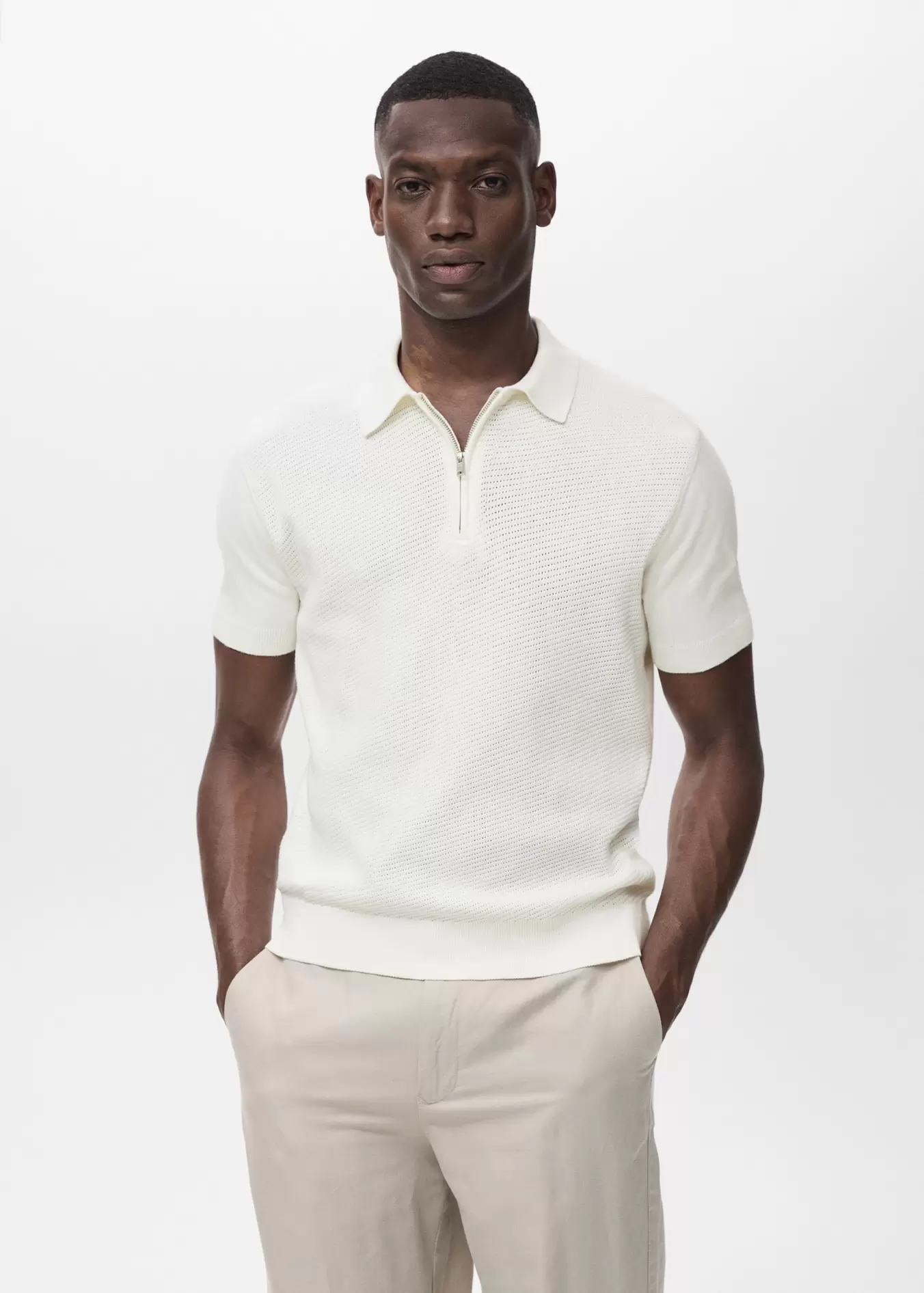 Oferta de Polo punto calado cremallera por 29,99€ en MANGO Man