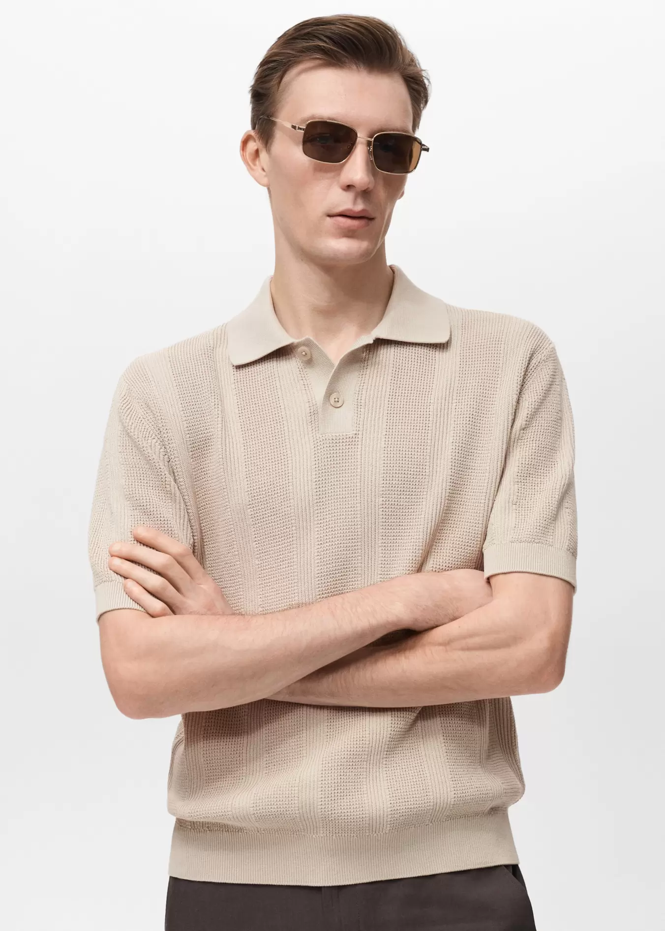Oferta de Polo punto calado estructura rayas por 35,99€ en MANGO Man