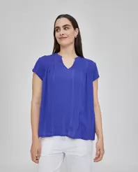 Oferta de BLUSA HILO METALICO CONCUELLO MAO Y BORDADOS EN CANESU AZUL por 35,99€ en October