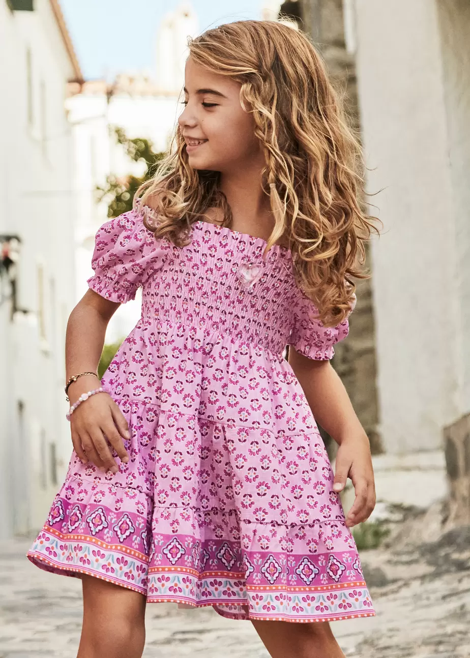 Oferta de Vestido estampado cenefa nido de abeja niña por 32,99€ en Mayoral