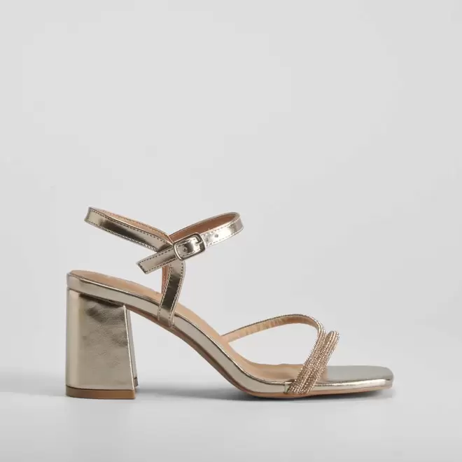 Oferta de Sandalia tacón fiesta oro PICCOLA PIU por 35,99€ en Merkal