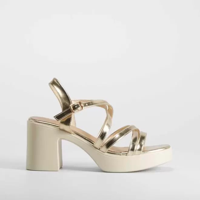 Oferta de Sandalia tacón tiras oro NYC por 29,99€ en Merkal