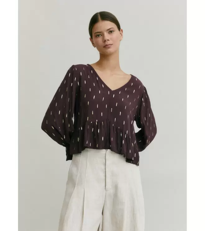 Oferta de BLUSA DETALLE BRILLO por 18,99€ en Mulaya