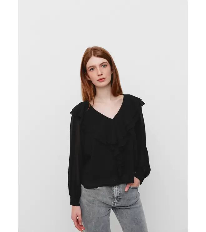 Oferta de BLUSA VOLANTES ESCOTE PICO por 17,99€ en Mulaya