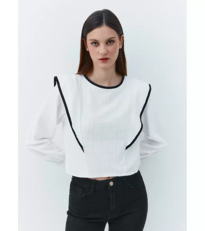 Oferta de BLUSA PLUMETI VOLANTE por 25,95€ en Mulaya