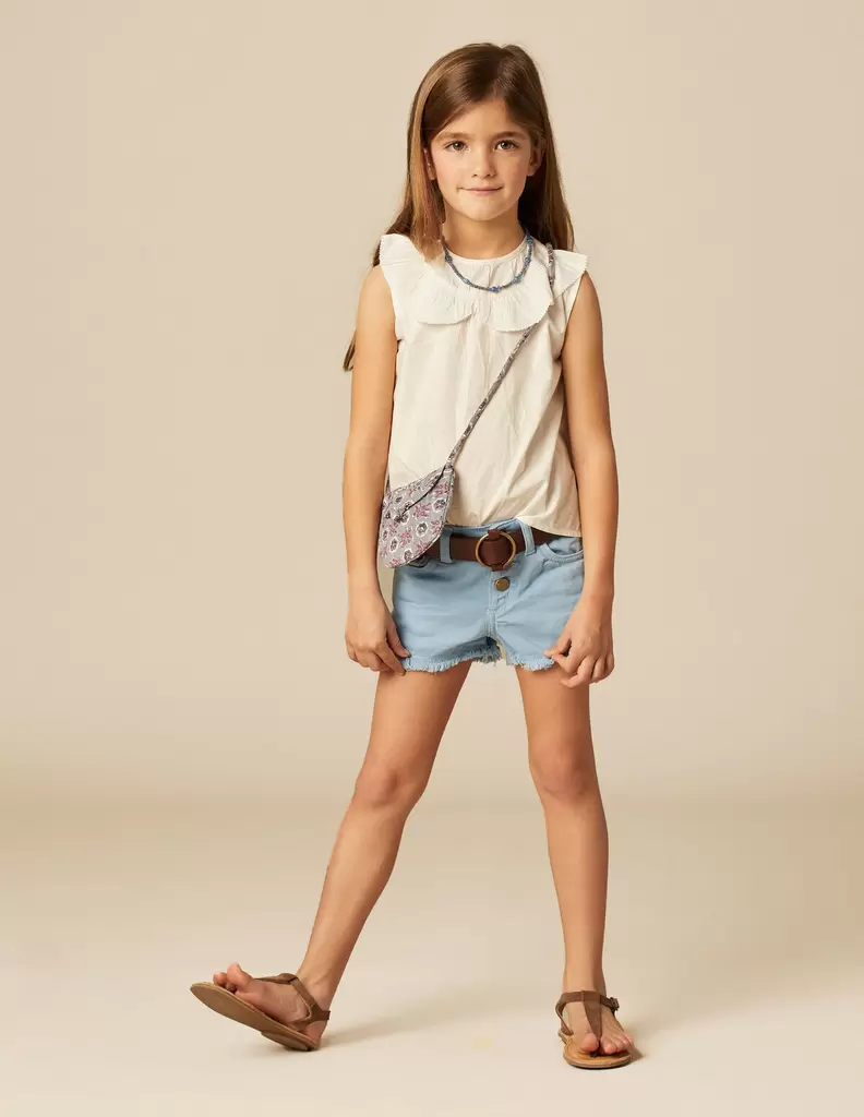 Oferta de SHORT DENIM AZUL CLARO por 17,99€ en Nícoli