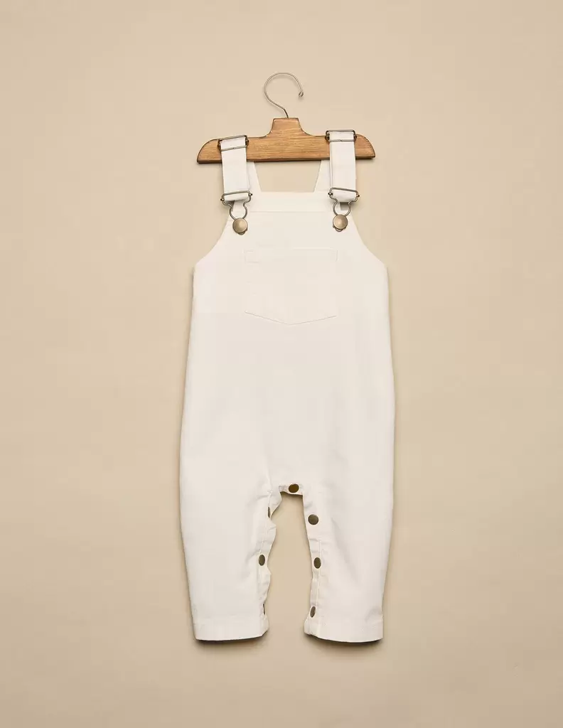 Oferta de PETO BEBÉ DENIM BLANCO por 39,9€ en Nícoli