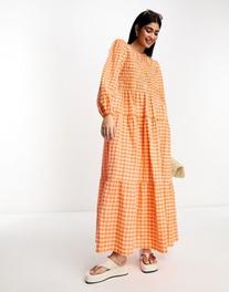 Oferta de Vestido largo a cuadros rosas y naranjas fruncido de corte amplio con mangas abullonadas de algodón de ASOS DESIGN por 51,99€ en Asos