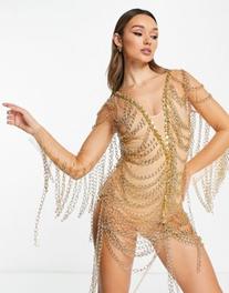 Oferta de Vestido corto dorado con diseño adornado de cadenas y flecos premium de Starry Eyed por 89€ en Asos