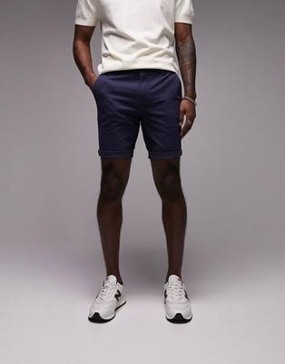 Oferta de Pantalones cortos chinos azul marino ajustados de Topman por 17,49€ en Asos