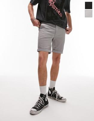 Oferta de Pack de 2 pantalones chinos de color negro y gris claro entallados de Topman por 38,99€ en Asos