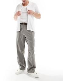 Oferta de Pantalones de vestir gris melange de pernera ancha con pinzas dobles de ASOS DESIGN por 37,99€ en Asos