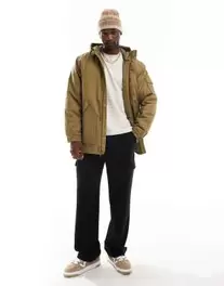 Oferta de Parka verde oliva con capucha Henrique de Vans por 160€ en Asos