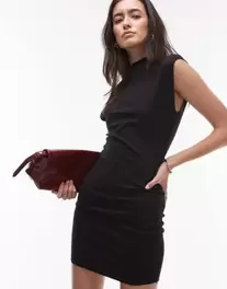 Oferta de Vestido corto negro sin mangas de Mango por 29,99€ en Asos