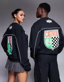 Oferta de Sudadera negra unisex de corte cuadrado extragrande con detalle de ribetes y estampado "Castrol Racing" de ASOS DESIGN por 44,99€ en Asos