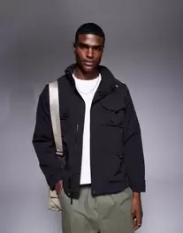 Oferta de Chaqueta negras utilitaria convertible de The North Face por 200€ en Asos