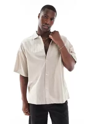 Oferta de Camisa beis extragrande de lino de Jack & Jones por 29,99€ en Asos