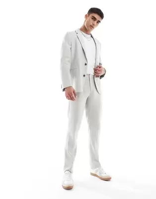 Oferta de Pantalones de traje verde claro de corte slim con patrón de espiga de mezcla de lino de ASOS DESIGN por 49,99€ en Asos