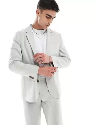Oferta de Chaqueta de traje verde claro de corte slim con patrón de espiga de mezcla de lino de ASOS DESIGN por 109€ en Asos