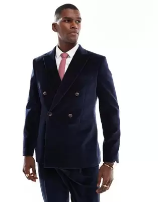 Oferta de Chaqueta de traje azul marino de corte slim de terciopelo de ASOS DESIGN por 129€ en Asos
