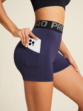 Oferta de Yoga Basic Mujeres sencillas pantalones cortos deportivos elásticos de cintura alta con bolsillo para teléfono y piernas anchas por 6€ en SheIn
