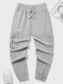 Oferta de SHEIN Hombres Pantalones deportivos con bolsillo lateral con solapa de cintura con cordón por 7€ en SheIn