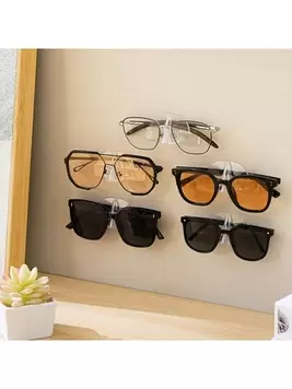 Oferta de 2 piezas de estante de pared para almacenamiento de gafas, soporte de exhibición de gafas para el hogar, sin necesidad de taladrar, apto para gafas de sol, gafas de miopía, almacenamiento en el dor... por 1,75€ en SheIn