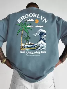 Oferta de Manfinity Hypemode Camiseta de manga corta casual de hombre con estampado tropical de palmeras y letras, para salir, regalo para el novio por 7,34€ en SheIn