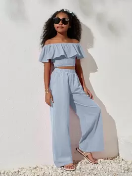 Oferta de SHEIN Conjunto casual para niña preadolescente con parte superior corta de hombros descubiertos y pantalones holgados de unicolor tejido, primavera/verano por 18,69€ en SheIn