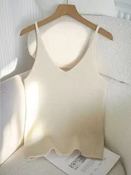 Oferta de Chiquease Camiseta sin mangas de escote en V para mujer, suéter de punto de unicolor suelto y casual para el verano por 5,99€ en SheIn